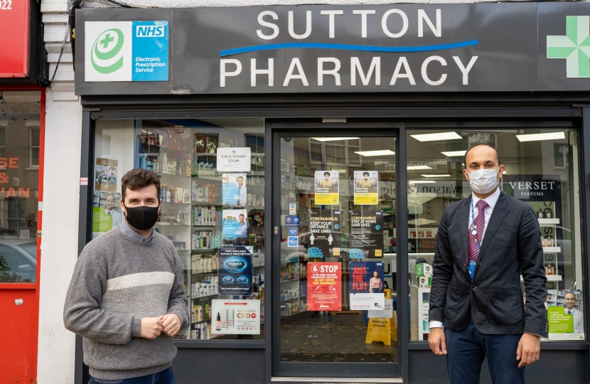 Elliot outside Sutton Pharmacy