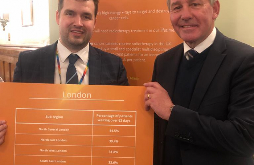 Elliot with former England footballer Bryan Robson at the Radiotherapy UK event.